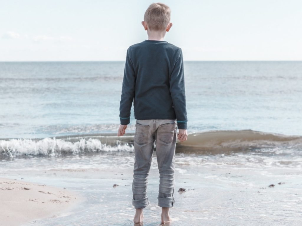 foster child looking out to the water