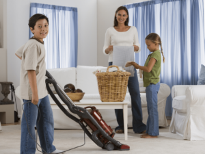 children doing chores with their mother